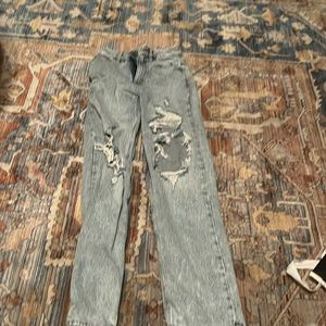 Light blue, 90’s boyfriend style jeans, ripped, comfortable material, pacsun